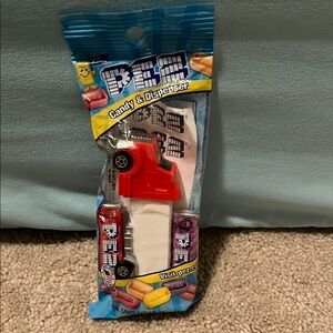 Red and White Toy Car with Candy Dispenser